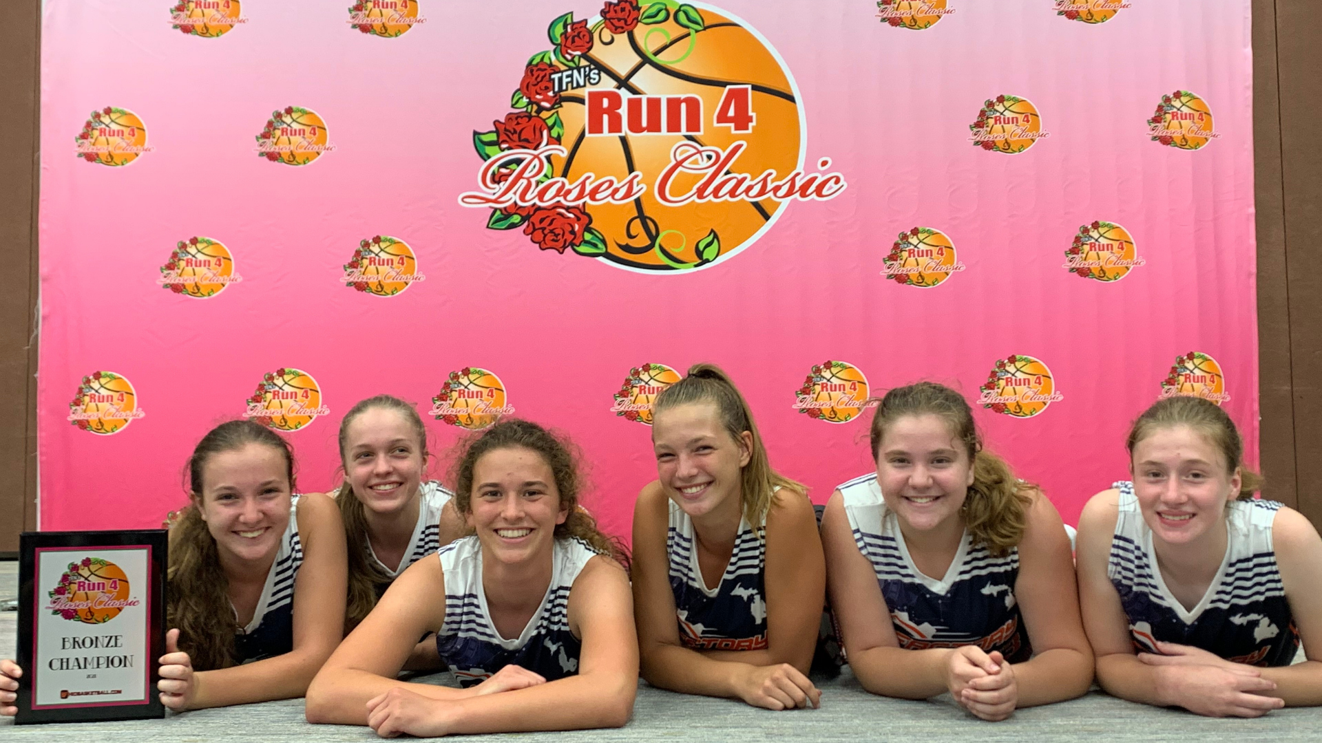 Factory Basketball players celebrating together